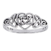 Silver ring with heart and Celtic triquetra trinity knot design on a white background